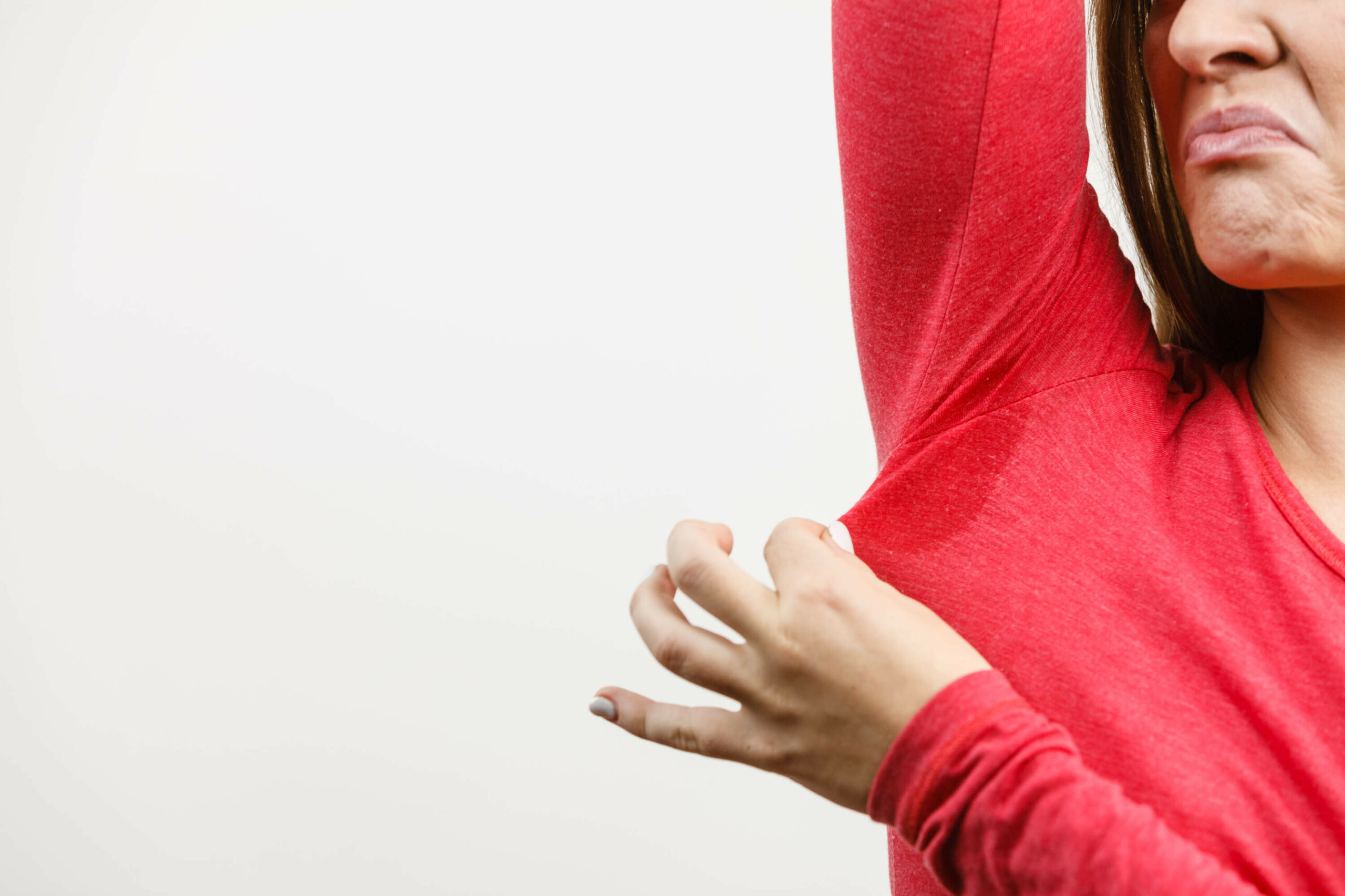 woman with underarm sweat stain